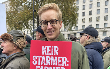 James holds placard at protest